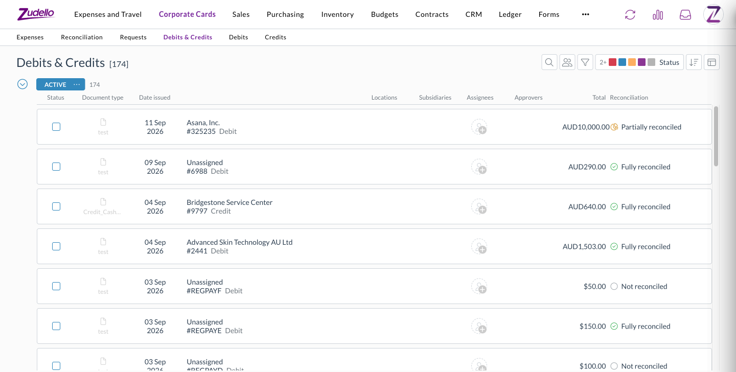The Debits &amp; Credits tab under Corporate Cards, listing debits and credits with their reconciliation status